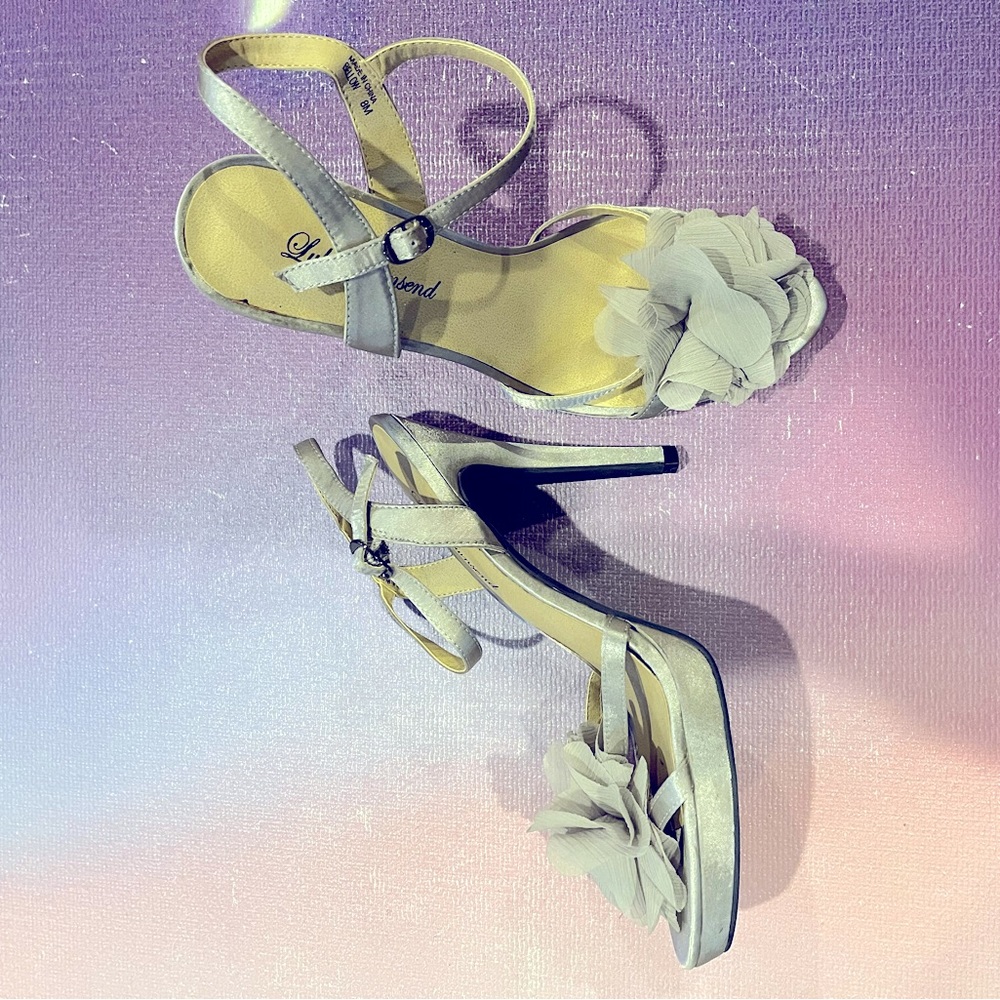 Gray/silver shoes. Size 8. Gently worn for prom. Size 8